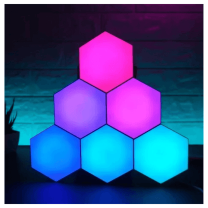 Luces Hexagonales 17 Colores LED en vibrantes tonos rosa y azul, perfectas para crear ambientes únicos.